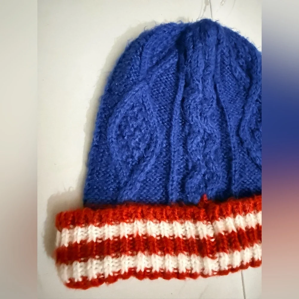 Boden Small Blue Knit Beanie with Red and White Stripes.